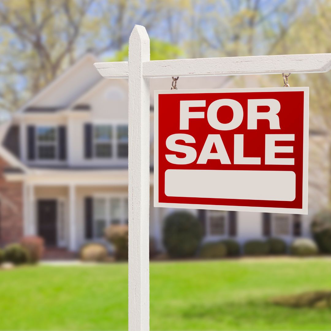 Helps You Sell A Home home with a for sale sign out front